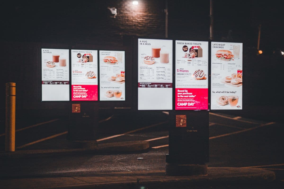 A bright fast-food menu board