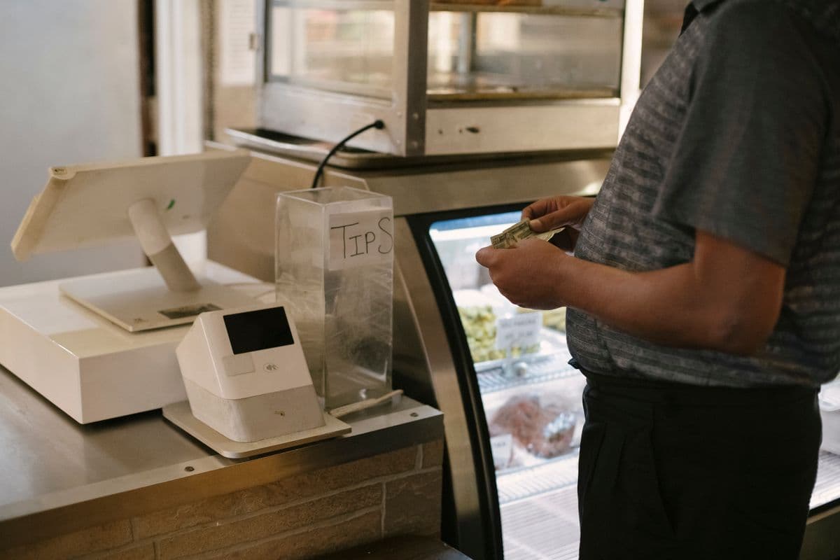 A cash tip left on a receipt